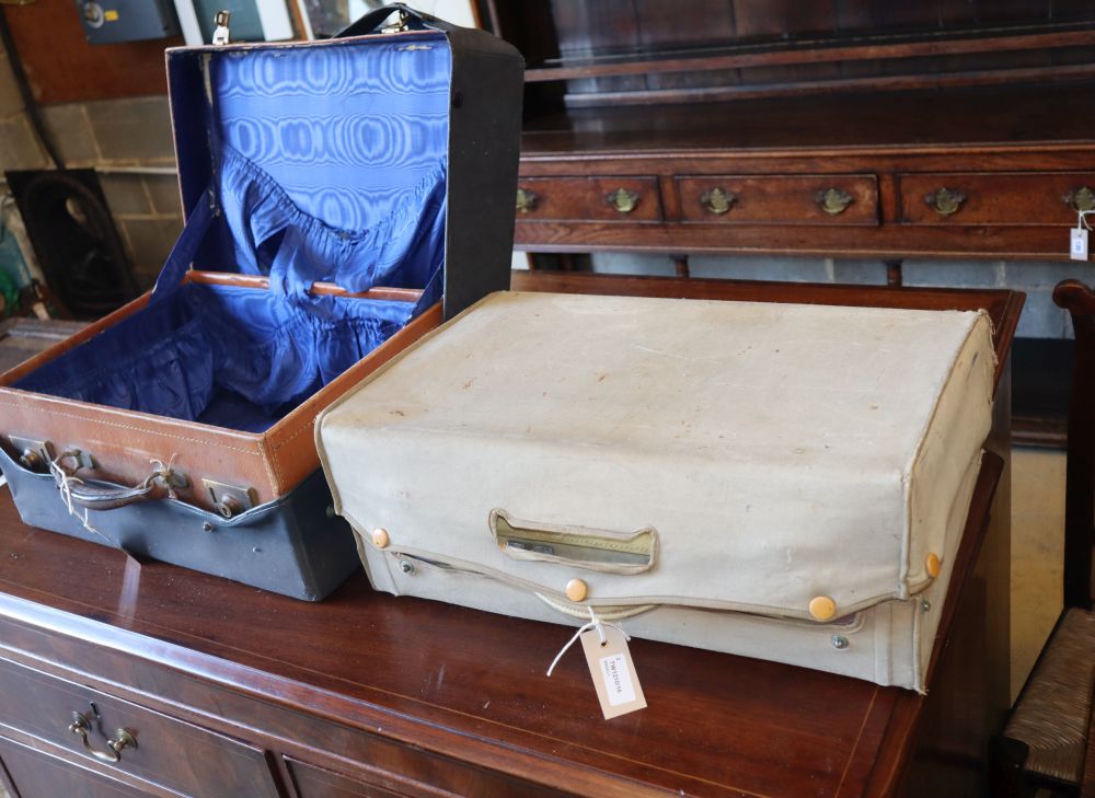 A ladys vellum dressing case and a gentlemans morocco dressing case, larger 50 x 34cm